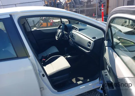 2012 Toyota Yaris Le z USA, uszkodzony, nr VIN JTDKTUD35CD525726